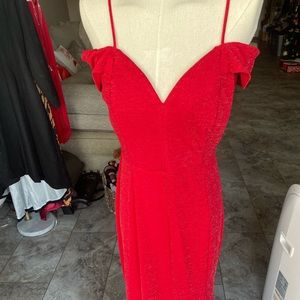 Beautiful off the shoulder red dress in a shimmery fabric with adjustable straps